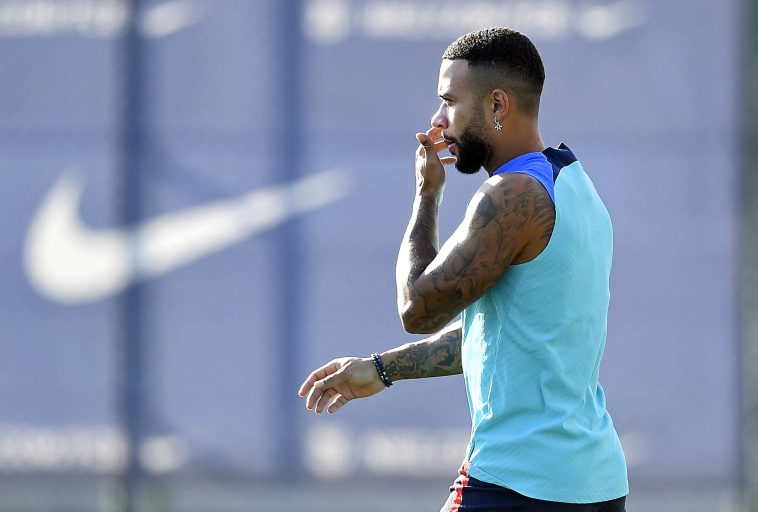 Barcelona's Dutch forward Memphis Depay attends a training session at the Joan Gamper training ground in Sant Joan Despi, near Barcelona on August 6, 2022