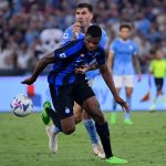 Inter-Milan's Dutch midfielder Denzel Dumfries (R) is challenged by Lazio's italian defender Luiz Felipe during the Italian Serie A football match between Lazio and Inter-Milan at the Olympic stadium in Rome on August 26, 2022