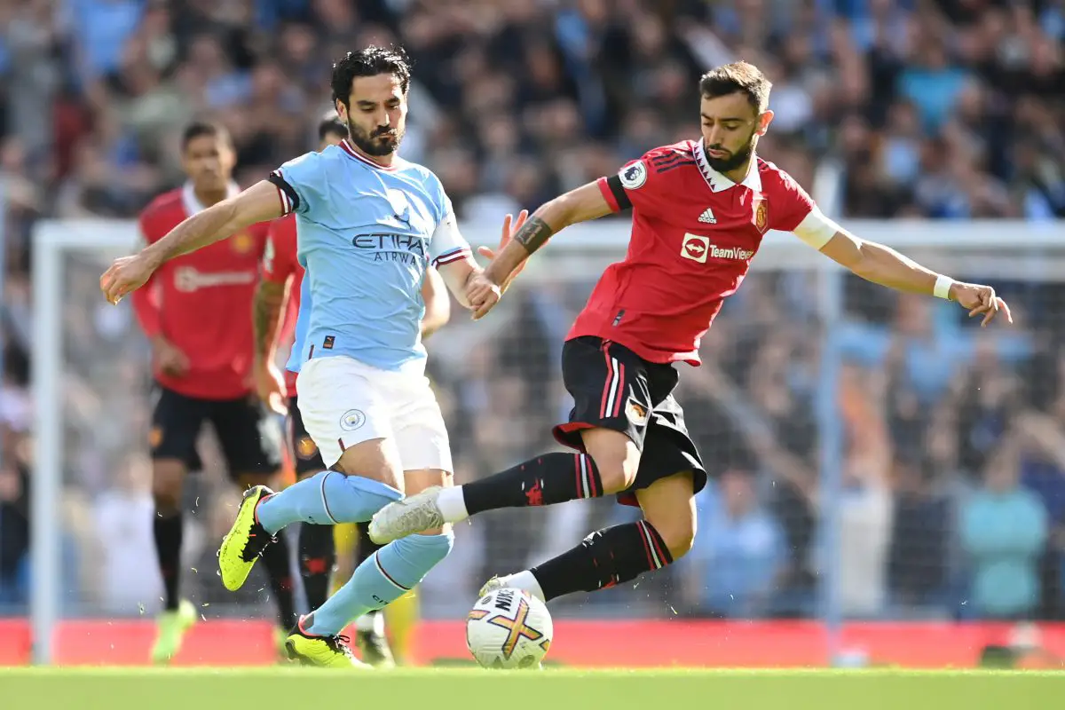Ilkay Gundogan of Manchester City battles for possession with Bruno Fernandes of Manchester United during the Premier League match between Manchester City and Manchester United at Etihad Stadium on October 02, 2022 in Manchester, England