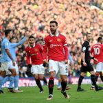 Bruno Fernandes of Manchester United celebrates after scoring the team's first goal during the Premier League match between Manchester United and Manchester City at Old Trafford on January 14, 2023 in Manchester, England.