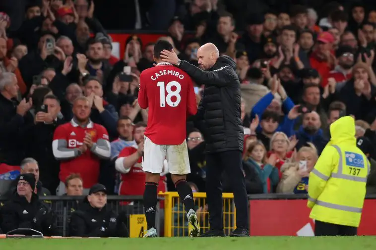 Erik ten Hag embraces Casemiro of Manchester United after they are substituted during the Premier League match between Manchester United and Tottenham Hotspur at Old Trafford on October 19, 2022 in Manchester, England.