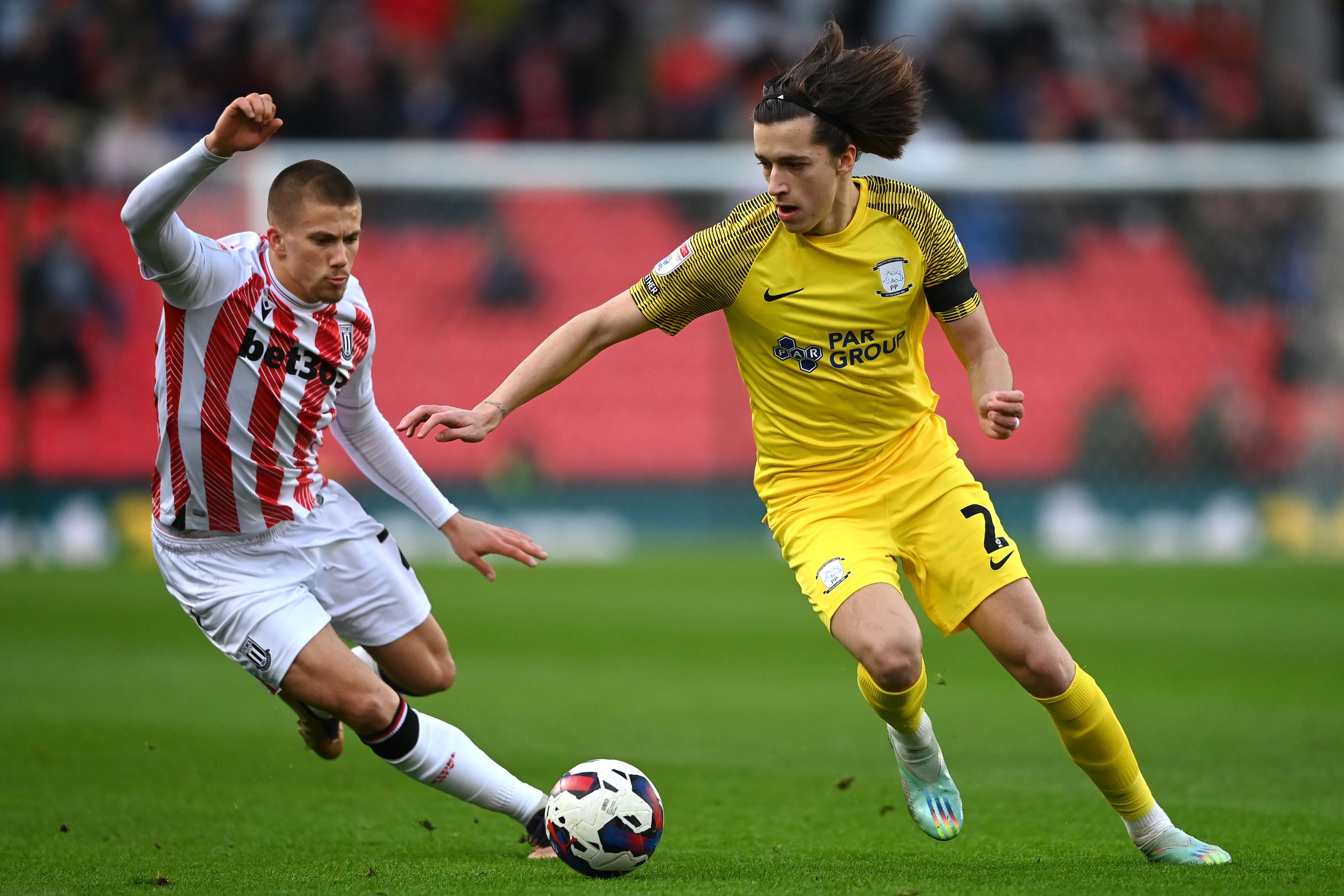 Alvaro Fernandez Preston North End battles for the ball with Harry Clarke of Stoke City Football Club during the Sky Bet Championship between Stoke City and Preston North End at Bet365 Stadium on January 02, 2023 in Stoke on Trent, England.