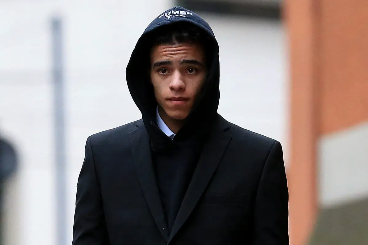England and Manchester United footballer Mason Greenwood leaves Minshull Street Crown Court in Manchester on November 21, 2022 after a preliminary hearing on charges of attempted rape, controlling and coercive behaviour, and assault. - The 21-year-old was first arrested in January over allegations relating to a young woman after images and videos were posted online. All three charges relate to the same complainant.