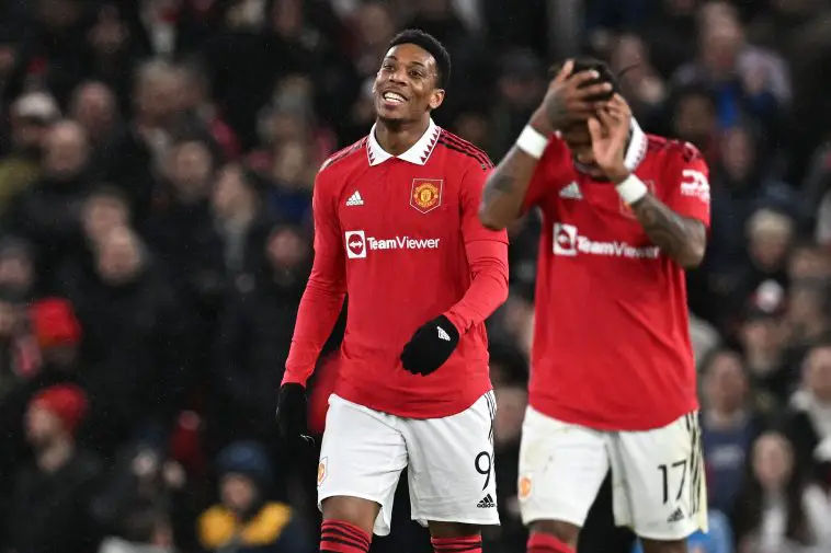 Manchester United's French striker Anthony Martial (L) celebrates scoring the opening goal during the English League Cup semi-final second-leg football match between Manchester United and Nottingham Forest at Old Trafford in Manchester, north west England, on February 1, 2023