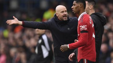 Manchester United's Dutch manager Erik ten Hag (L) gestures as Manchester United's English striker Marcus Rashford waits to return to the pitch during the English Premier League football match between Leeds United and Manchester United at Elland Road in Leeds, northern England on February 12, 2023