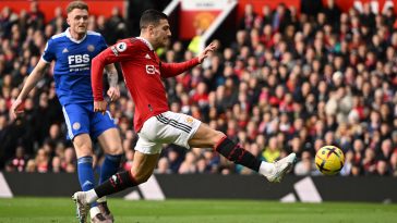 Manchester United's Portuguese defender Diogo Dalot shoots but fails to score during the English Premier League football match between Manchester United and Leicester City at Old Trafford in Manchester, north west England, on February 19, 2023.