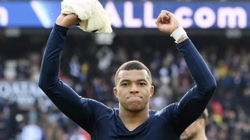 Paris Saint-Germain's French forward Kylian Mbappe celebrates his team's victory after the French L1 football match between Paris Saint-Germain (PSG) and Lille LOSC at The Parc des Princes Stadium in Paris on February 19, 2023