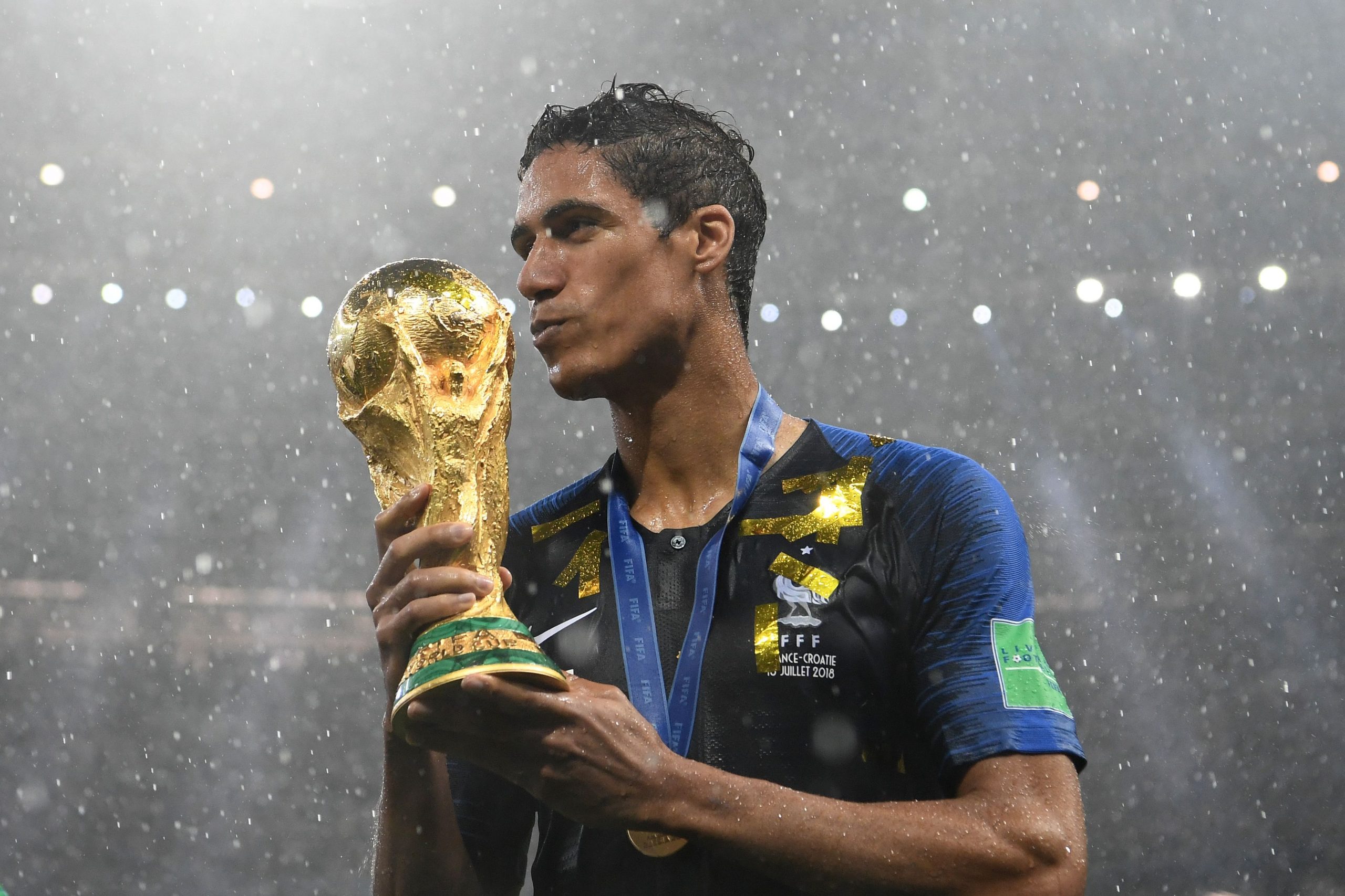 Raphael Varane holds the World Cup trophy after winning the Russia 2018 World Cup final football match between France and Croatia at the Luzhniki Stadium in Moscow on July 15, 2018