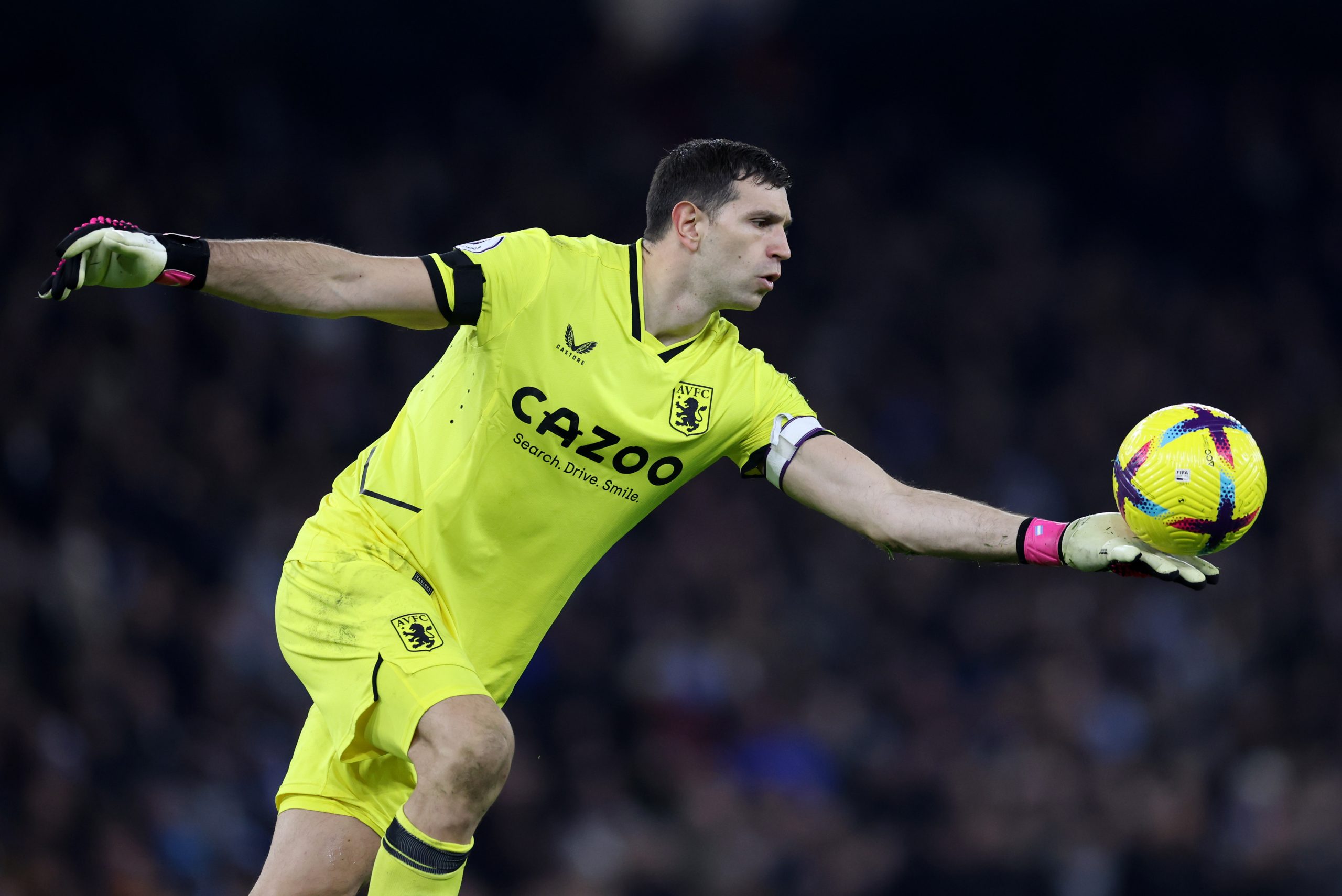 Emiliano Martinez of Aston Villa in action during the Premier League match between Manchester City and Aston Villa at Etihad Stadium on February 12, 2023 in Manchester, England