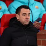 Xavi, head coach of FC Barcelona, looks on prior to the UEFA Europa League knockout round play-off leg two match between Manchester United and FC Barcelona at Old Trafford on February 23, 2023 in Manchester, England.