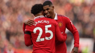 Marcus Rasford of Manchester United celebrates with Jadon Sancho after scoring the second goal during the Premier League match between Manchester United and Leicester City at Old Trafford on February 19, 2023 in Manchester, England