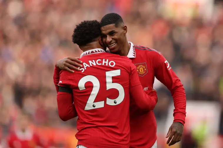 Marcus Rasford of Manchester United celebrates with Jadon Sancho after scoring the second goal during the Premier League match between Manchester United and Leicester City at Old Trafford on February 19, 2023 in Manchester, England