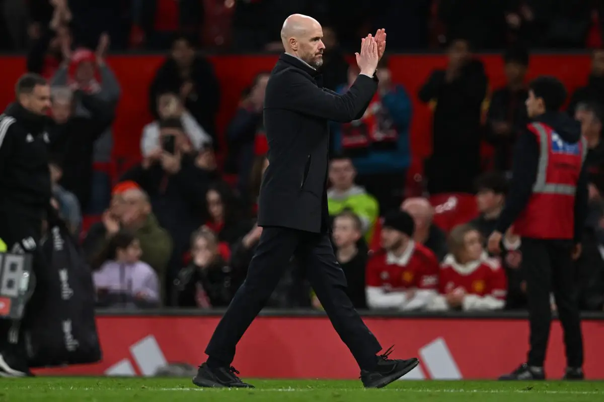 Manchester United's Dutch manager Erik ten Hag applauds fans on the pitch after the English FA Cup quarter-final football match between Manchester United and Fulham at Old Trafford in Manchester, north-west England, on March 19, 2023. - Man Utd won the game 3-1. 