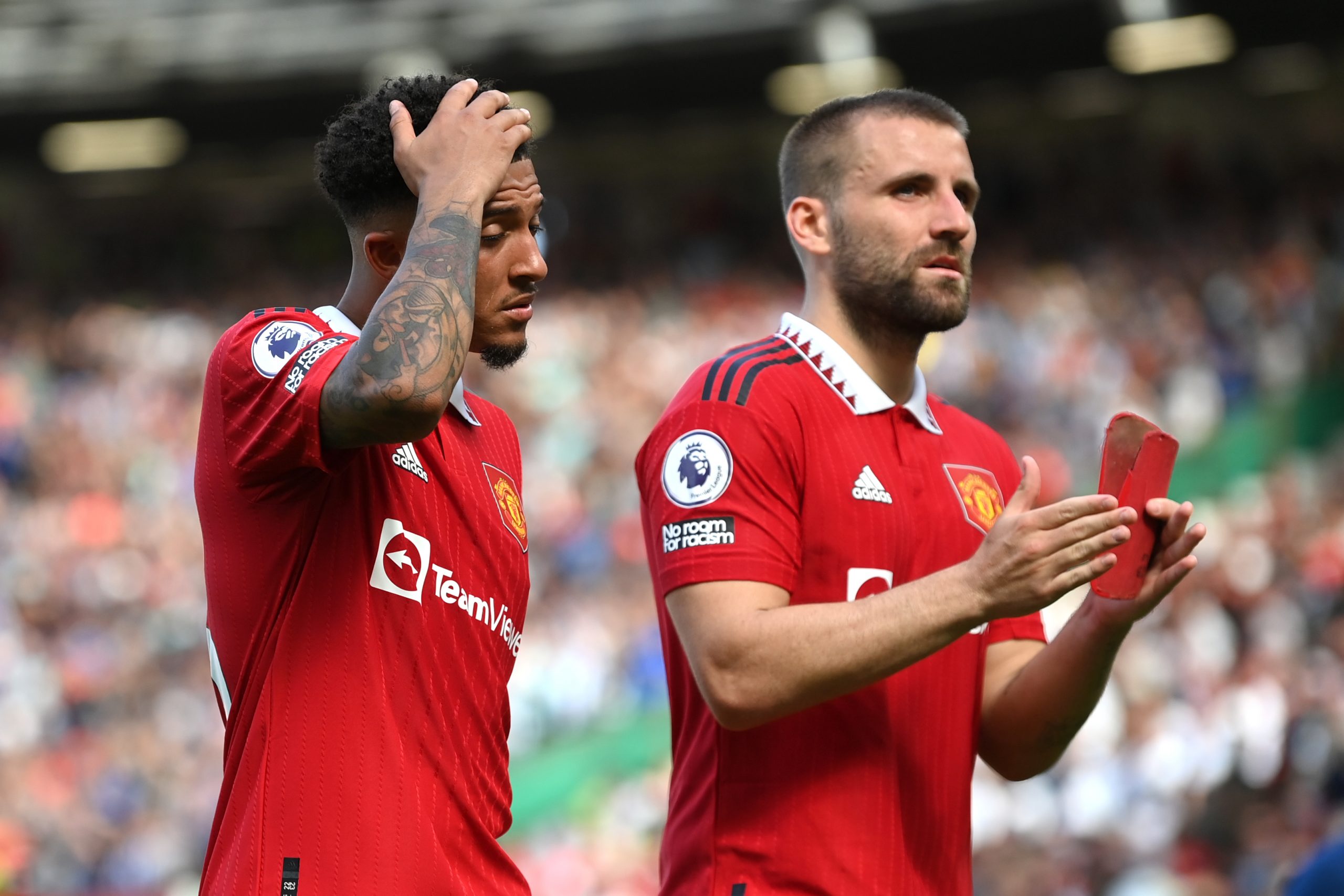 Jadon Sancho and Luke Shaw of Manchester United react after the Premier League match between Manchester United and Brighton & Hove Albion at Old Trafford on August 07, 2022 in Manchester, England