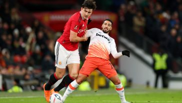 Harry Maguire of Manchester United is put under pressure by Said Benrahma of West Ham United during the Emirates FA Cup Fifth Round match between Manchester United and West Ham United at Old Trafford on March 01, 2023 in Manchester, England.