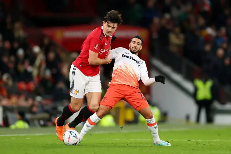 Harry Maguire of Manchester United is put under pressure by Said Benrahma of West Ham United during the Emirates FA Cup Fifth Round match between Manchester United and West Ham United at Old Trafford on March 01, 2023 in Manchester, England.