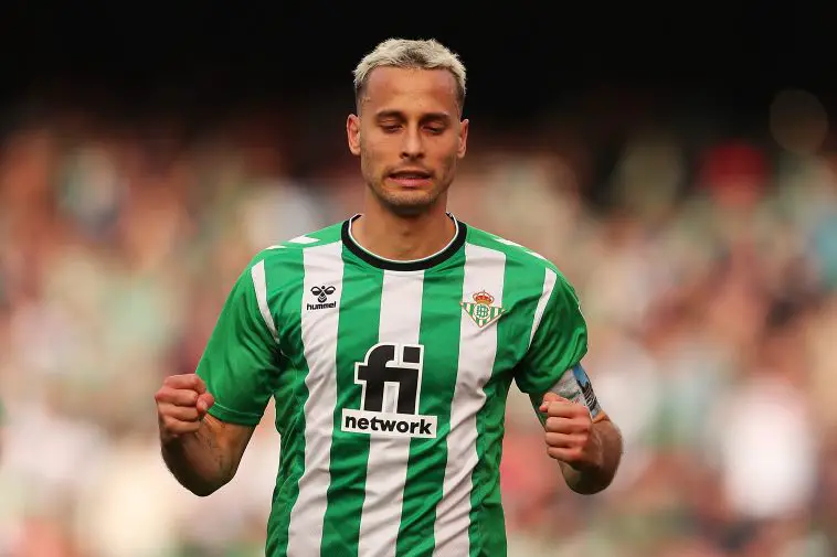 Sergio Canales of Real Betis celebrates after scoring the team's second goal from the penalty spot during the LaLiga Santander match between Real Betis and Real Valladolid CF at Estadio Benito Villamarin on February 18, 2023 in Seville, Spain.