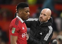 Manchester United's French striker Anthony Martial is greeted by Erik ten Hag.
