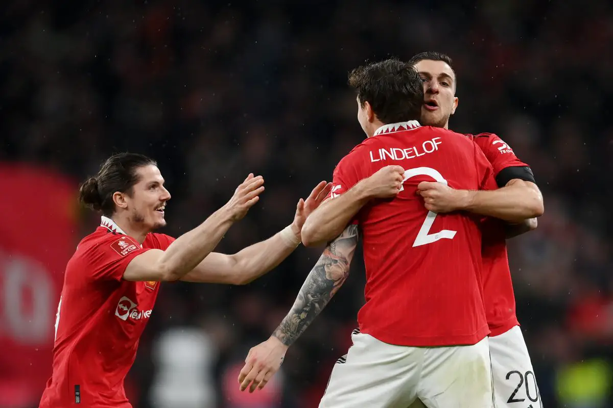 LONDON, ENGLAND - APRIL 23: Marcel Sabitzer, Victor Lindelof and Diogo Dalot of Manchester United celebrate after the team's victory in the penalty shoot out during the Emirates FA Cup Semi Final match between Brighton & Hove Albion and Manchester United at Wembley Stadium on April 23, 2023 in London, England.