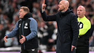 Newcastle United's Eddie Howe (L) and Manchester United's Erik ten Hag shouts instructions to the players from the touchline. (Photo by GLYN KIRK/AFP via Getty Images)