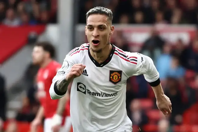 Manchester United's Brazilian midfielder Antony celebrates after scoring.