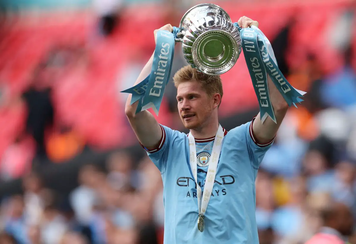 Manchester City's Belgian midfielder Kevin De Bruyne celebrates with the trophy after the 2023 FA Cup final. 