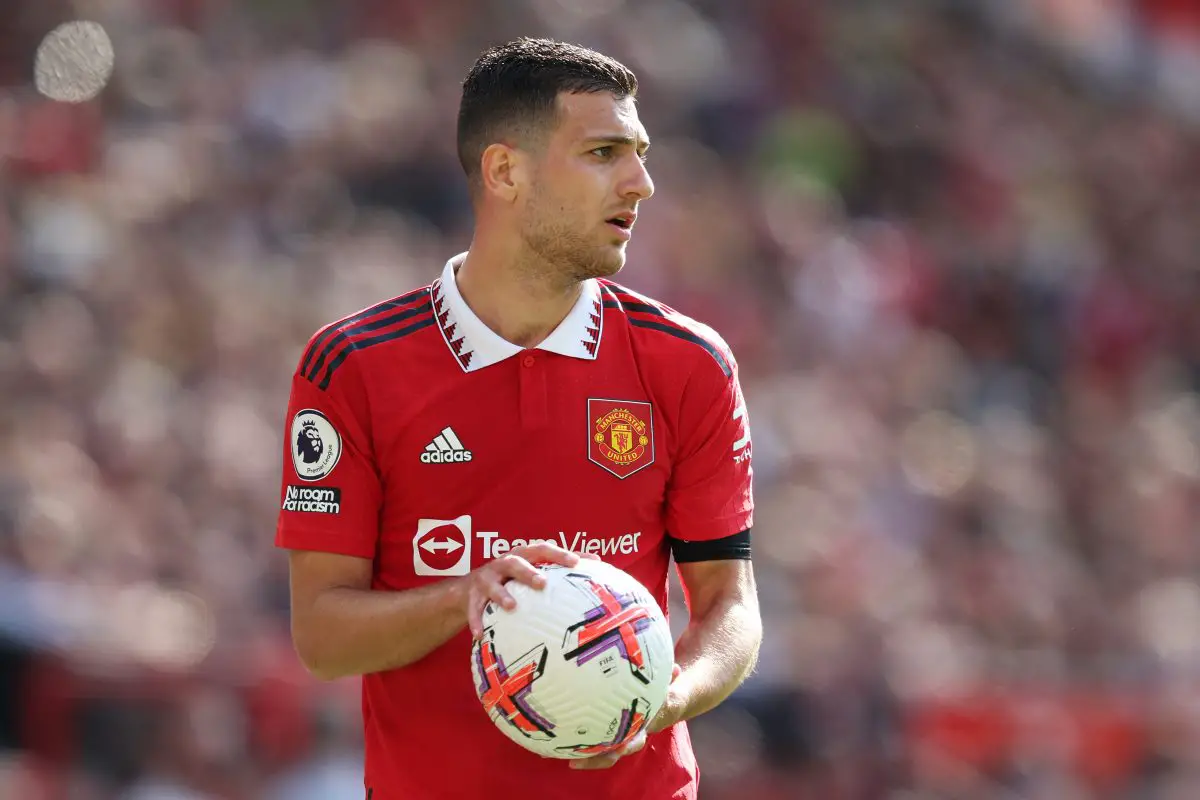 Diogo Dalot was sent off for an extremely bizarre reason during Manchester United's trip to Liverpool. (Photo by Matt McNulty/Getty Images)