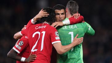 Cristiano Ronaldo of Manchester United celebrates their side's victory with Edinson Cavani and David De Gea.