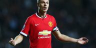 Jonny Evans re-signs for Manchester United on a short-term deal.