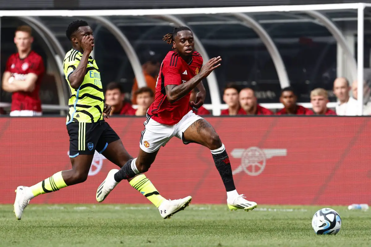 Aaron Wan Bissaka has issues with his socks (Photo by Rich Schultz/Getty Images)