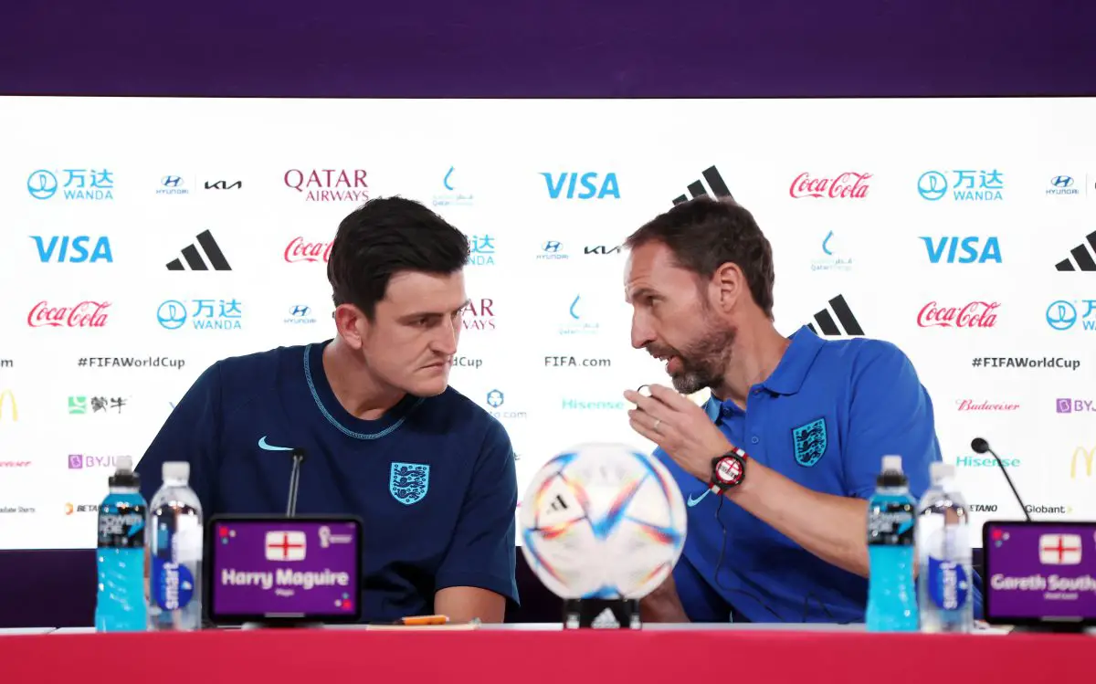 Harry Maguire of England and Gareth Southgate.