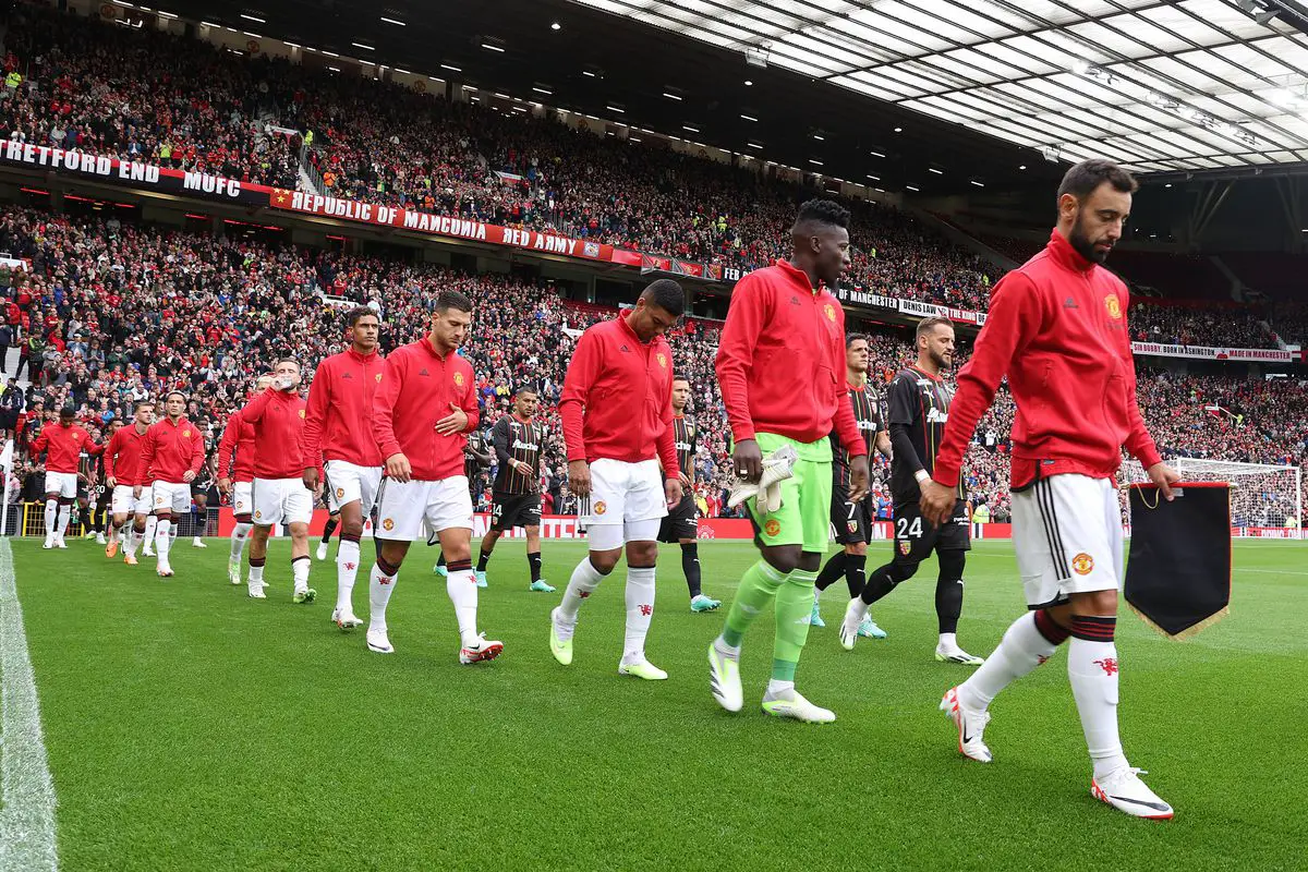 Manchester United players entering the pitch as they play their first Premier League game of the 2023-24 season (Photo by Matthew Peters/Manchester United via Getty Images)