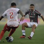 Fluminense defensive midfielder Andre downplays chances of joining Manchester United during the January transfer window.