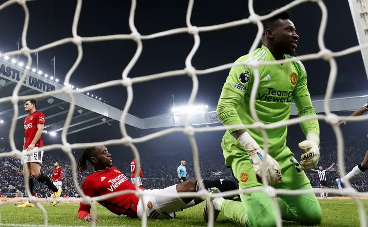 Andre Onana of Manchester United shows his dejection after conceding the only goal of the night against Newcastle United. (Photo by Clive Brunskill/Getty Images)