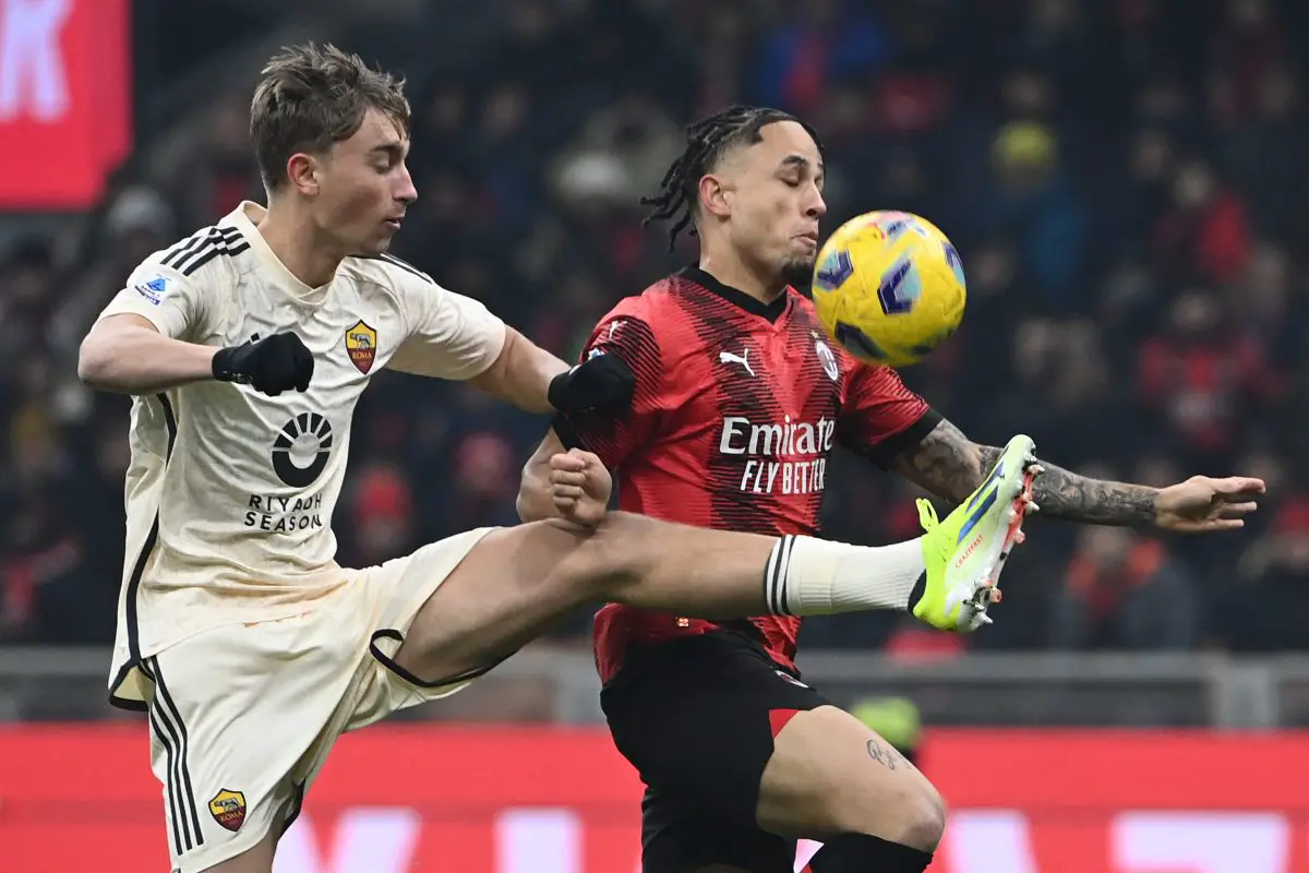 Roma's Dutch defender #03 Dean Huijsen (L) fights for the ball with AC Milan's Swiss forward #17 Noah Okafor during the Italian Serie A football match between AC Milan and AS Roma at San Siro Stadium, in Milan on January 14, 2024. (Photo by Isabella BONOTTO / AFP) (Photo by ISABELLA BONOTTO/AFP via Getty Images)