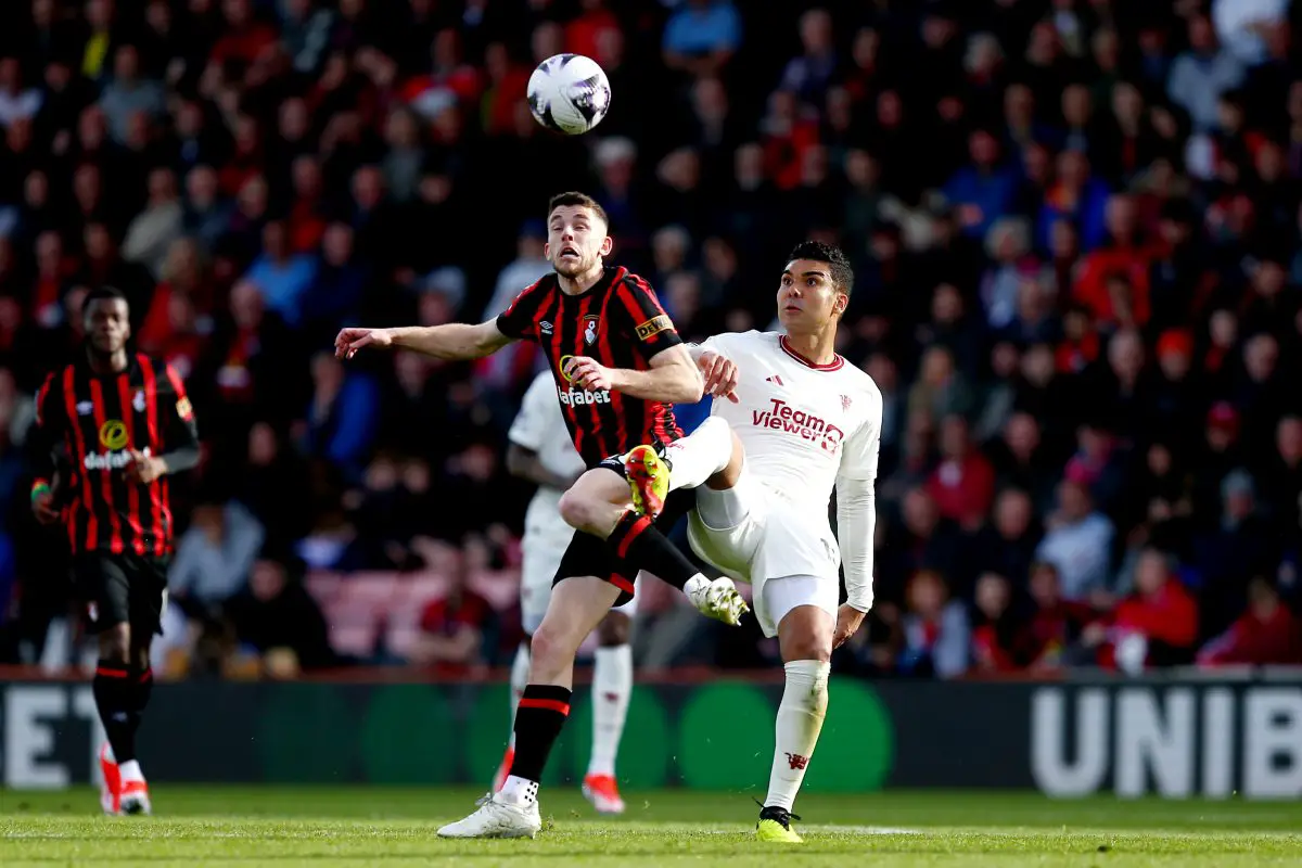BOURNEMOUTH, ENGLAND - APRIL 13: Ryan Christie of AFC Bournemouth and Casemiro of Manchester United battle for the ball during the Premier League match at Vitality Stadium on April 13, 2024 in Bournemouth, England. (Photo by Charlie Crowhurst/Getty Images) (Photo by Charlie Crowhurst/Getty Images)