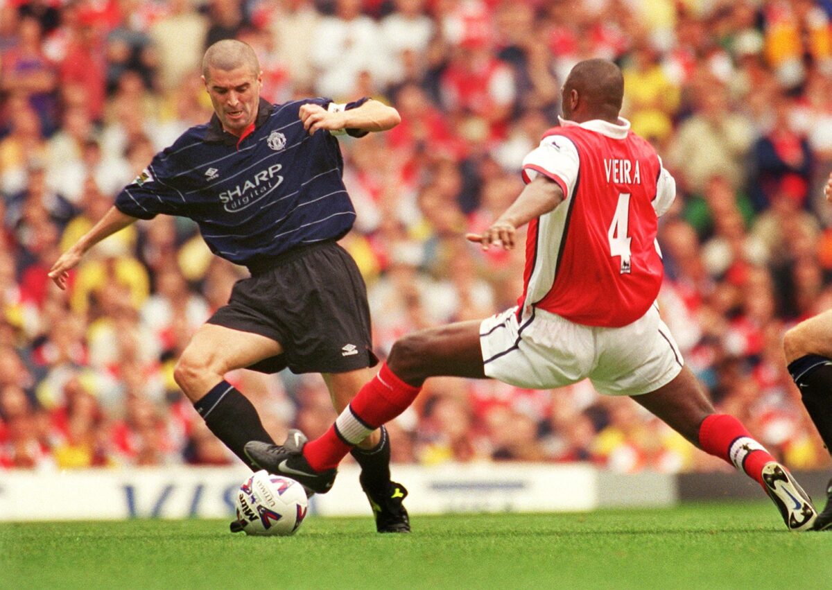 Patrick Vieira takes a jovial jab at Manchester United legend  Roy Keane.  (Photo by ADRIAN DENNIS/AFP via Getty Images)