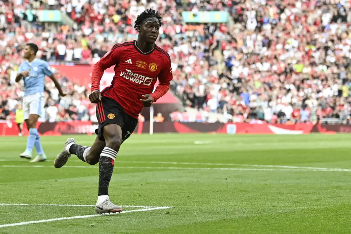 Mainoo for United in 2023/24 across all competitions: 35 appearances, 5 goals, 3 assists. (Photo by JUSTIN TALLIS / AFP) / NOT FOR MARKETING OR ADVERTISING USE / RESTRICTED TO EDITORIAL USE (Photo by JUSTIN TALLIS/AFP via Getty Images)